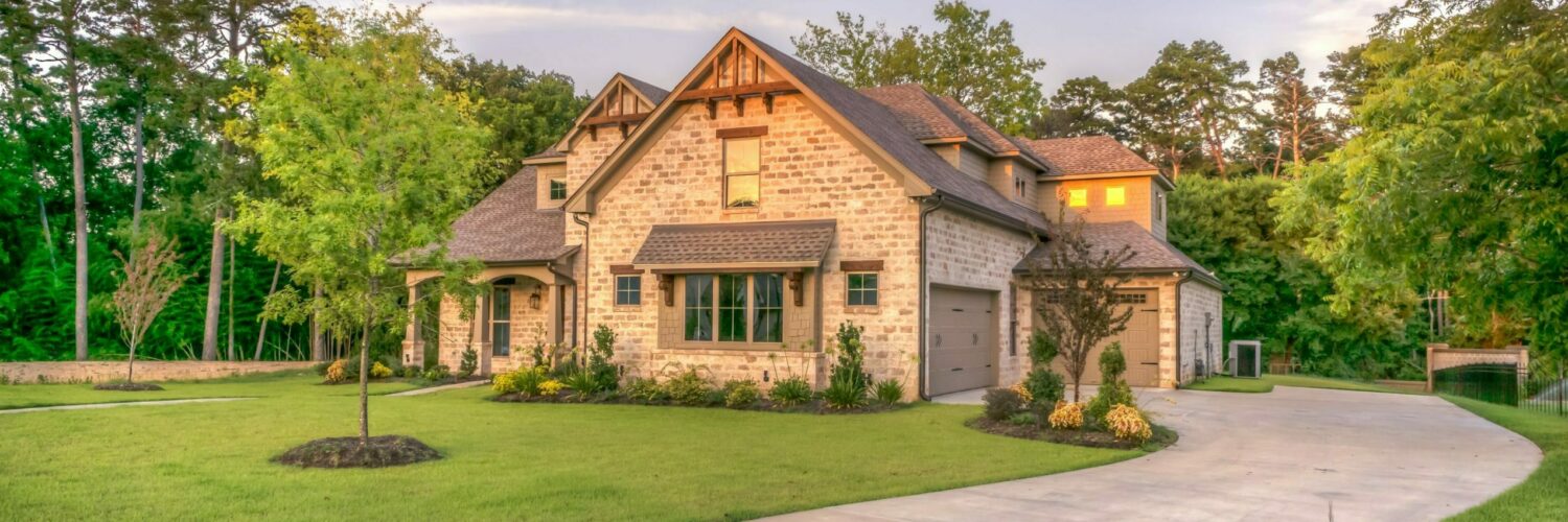 Nice house with manicured lawn